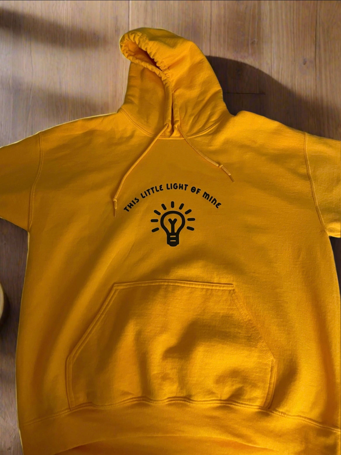“This little light of mine” yellow hooded sweatshirt