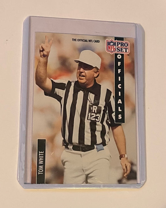 NFL official showing off how many calls he got right (1991 pro set)