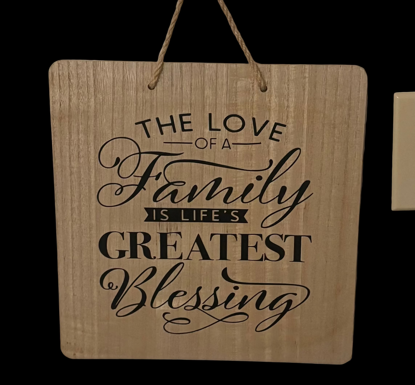 “Family first” wood sign
